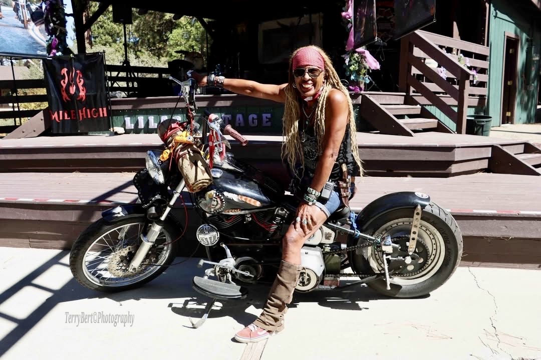 Gevin with her motorcycle at the Lilac Stage